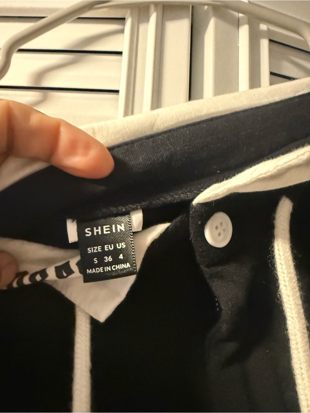 SHEIN Black Jacket with White Trim and Hood